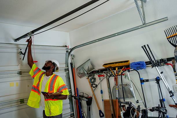 Professional Garage Door Panel Replacement technician working in St. Helen, MI